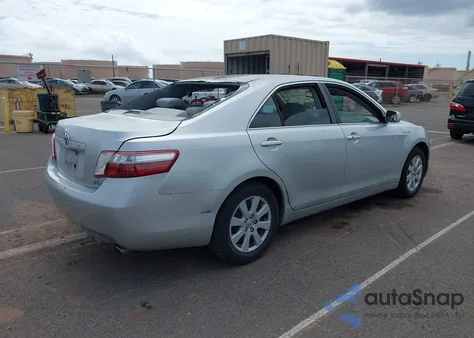 2009 Toyota Camry Hybrid z USA, uszkodzony, nr VIN JTNBB46K693050251